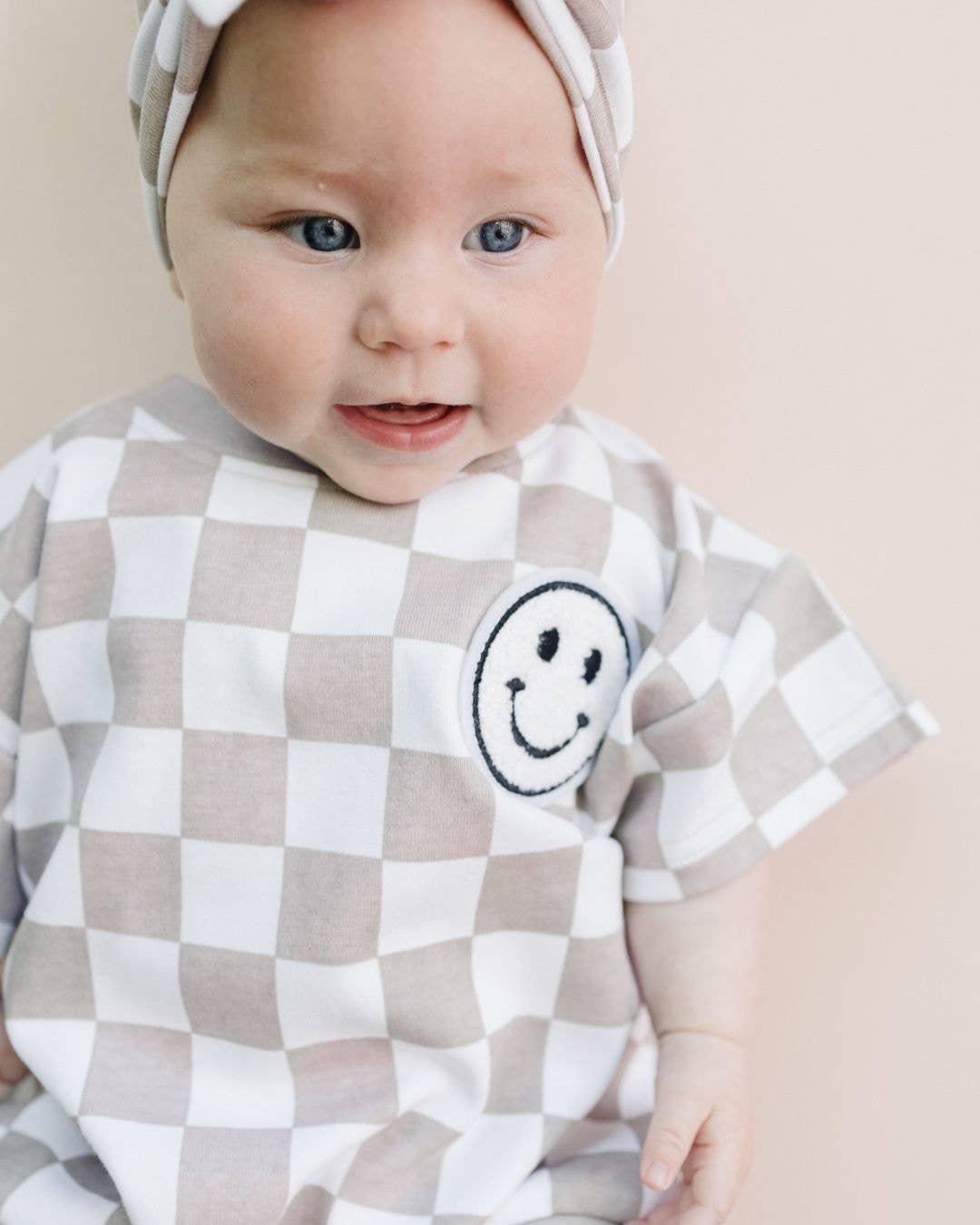 Short Sleeve Bubble Romper | Checkered Smiley Latte: Baby 0-3M