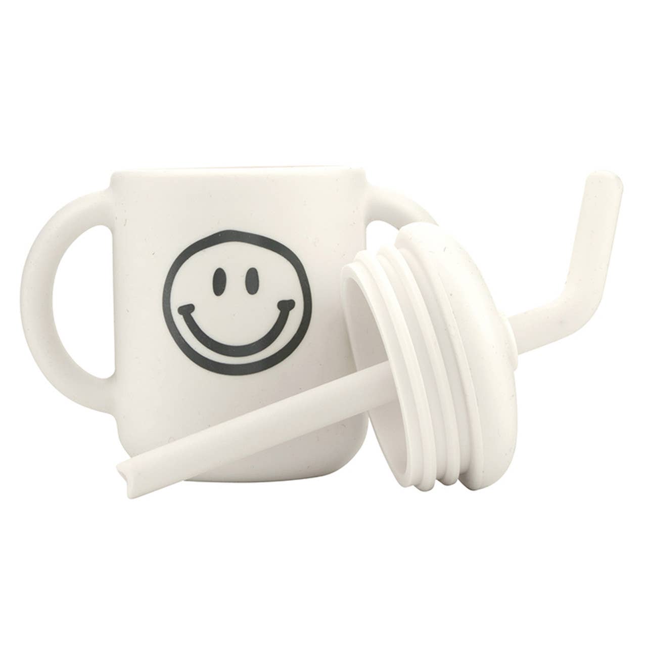 White sippy cup with smiley face design and straw on a white background
